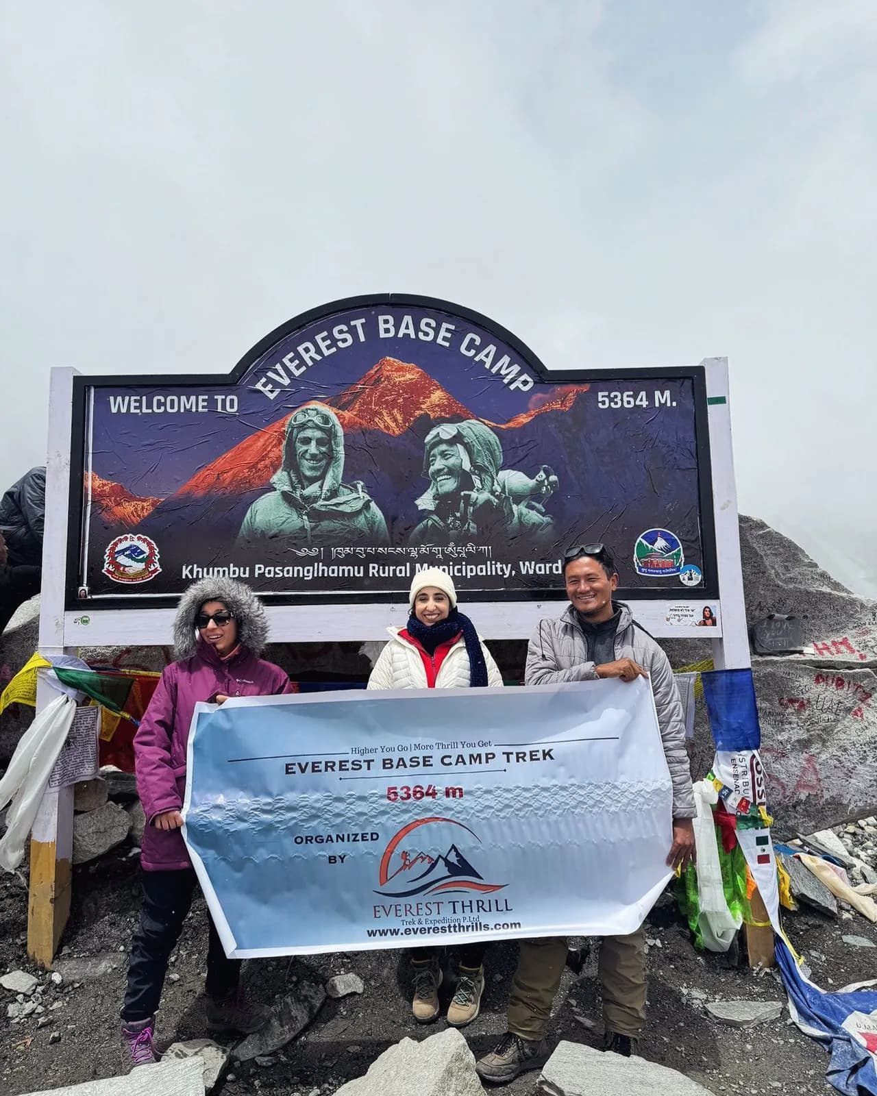 A group photo of Everest Thrill's happy clients at Everest Base Camp Summit
