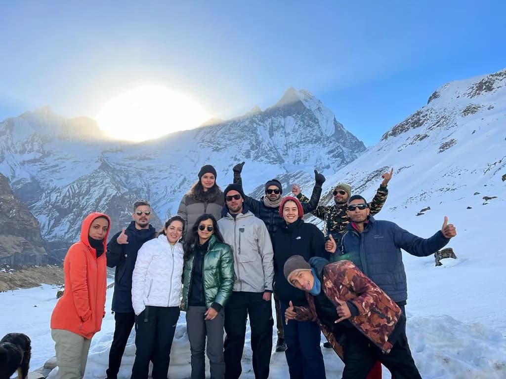 A group photo of Everest Thrill's Happy Clients at Annapurna Base Camp.