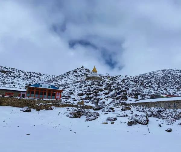 Snow-covered lodge during the EBC trek