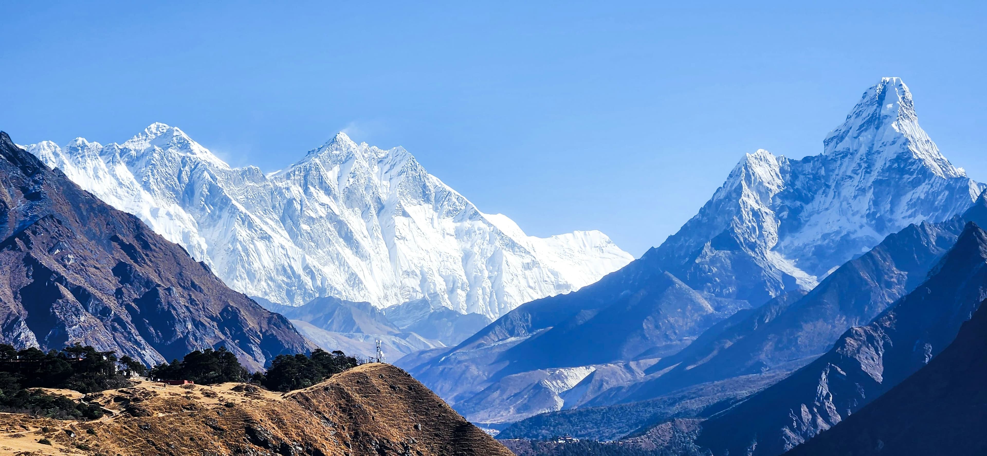 Panoramic view of the Mount Everest summit during golden hour as seen from the top of Kala Patthar.